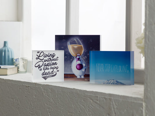 Decorative items on a shelf with motivational quotes and a cartoon character.