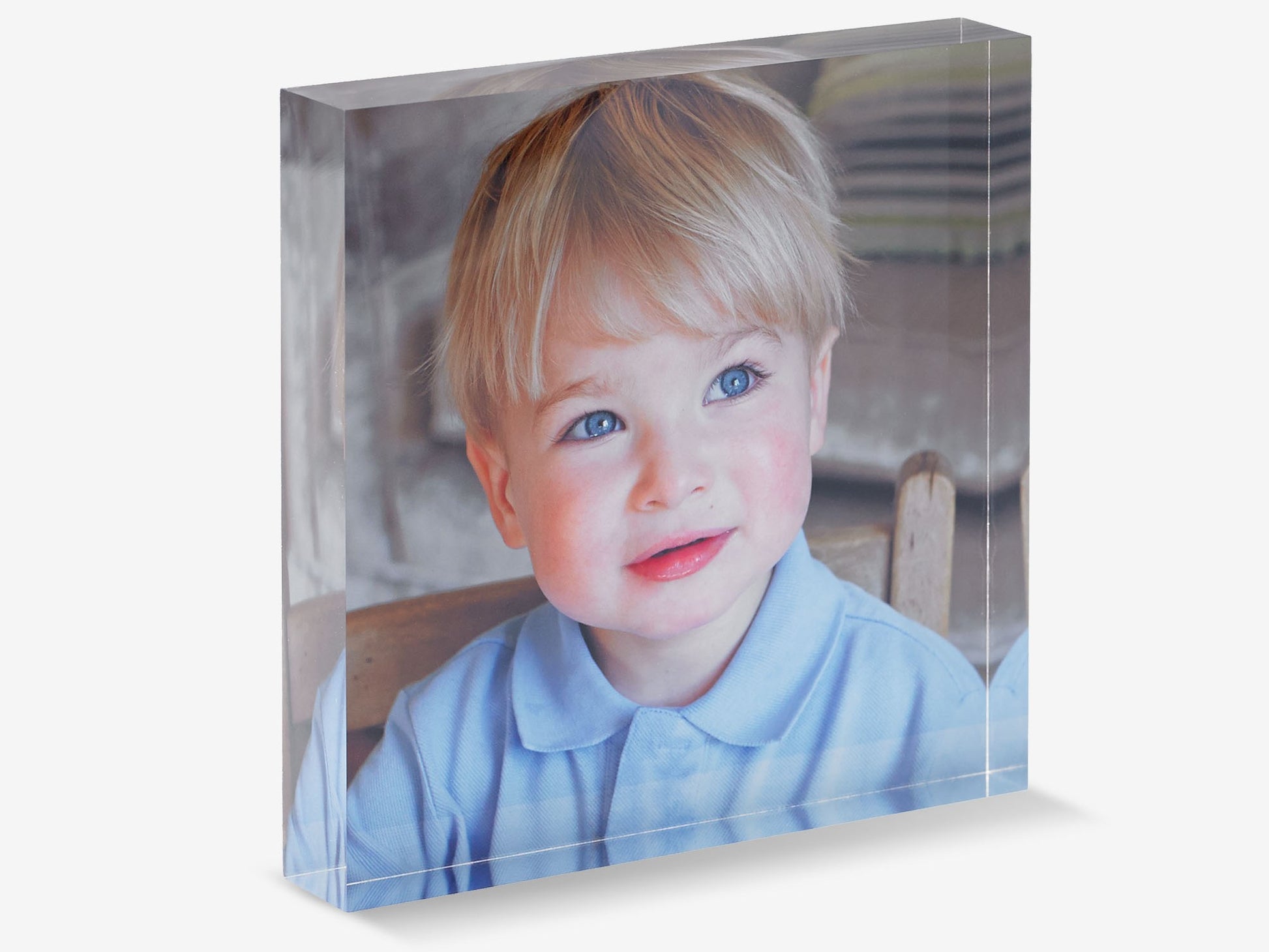Acrylic block with a photo of a young child on a white background